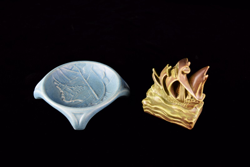 A Rookwood Ship Paperweight and Round Valet Tray with Ship Image