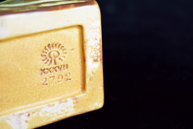 A Rookwood Ship Paperweight and Round Valet Tray with Ship Image