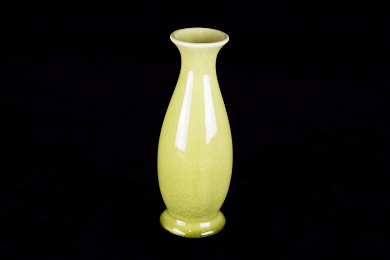 A Slender Rookwood Bud Vase in an Unusual Apple Green Glaze