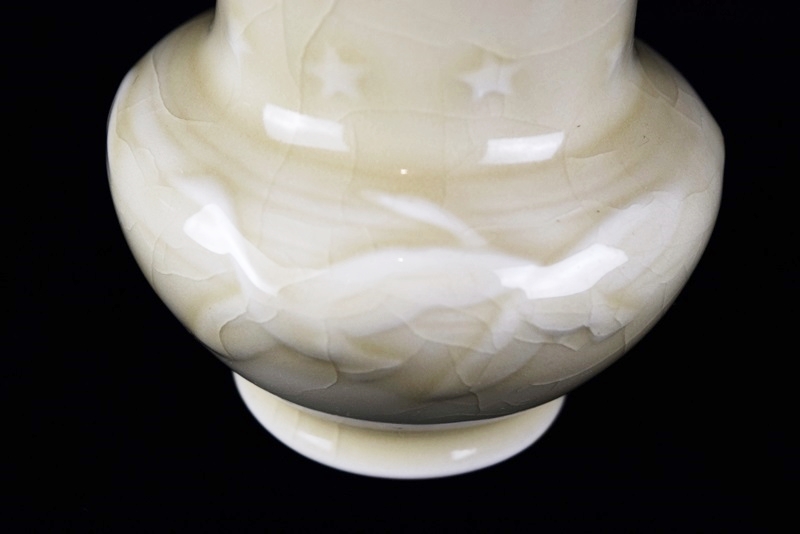 A Rookwood Vase Embossed with Geese & Stars in Pale Yellow Glaze