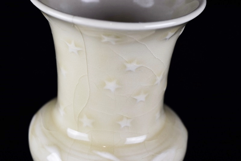 A Rookwood Vase Embossed with Geese & Stars in Pale Yellow Glaze