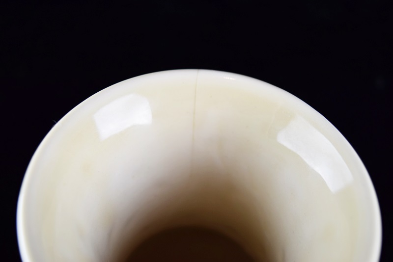 A Rookwood Vase Embossed with Geese & Stars in Pale Yellow Glaze