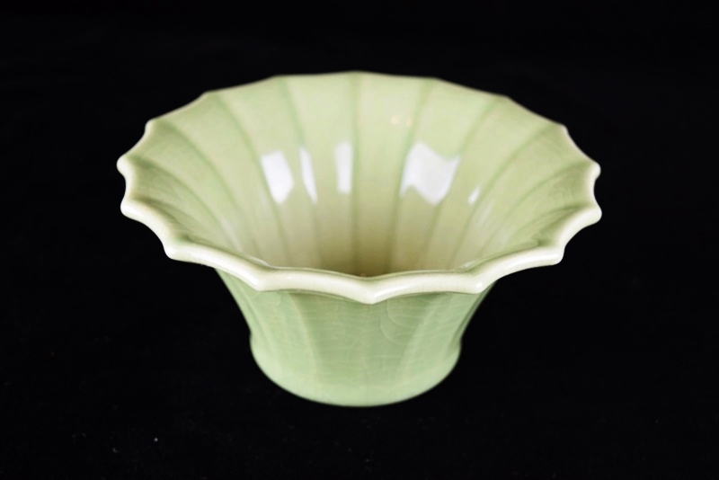 A Rookwood Fluted Bowl, Mold #6130, in a High Gloss Soft Green Gl