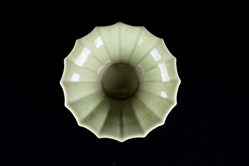 A Rookwood Fluted Bowl, Mold #6130, in a High Gloss Soft Green Gl