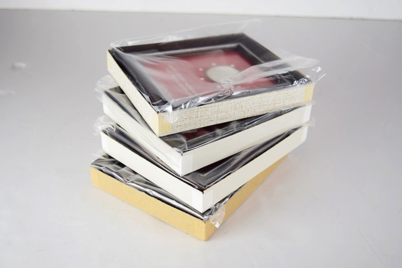 Four Uncirculated Fine Silver Liberty Dollars, Each Framed
