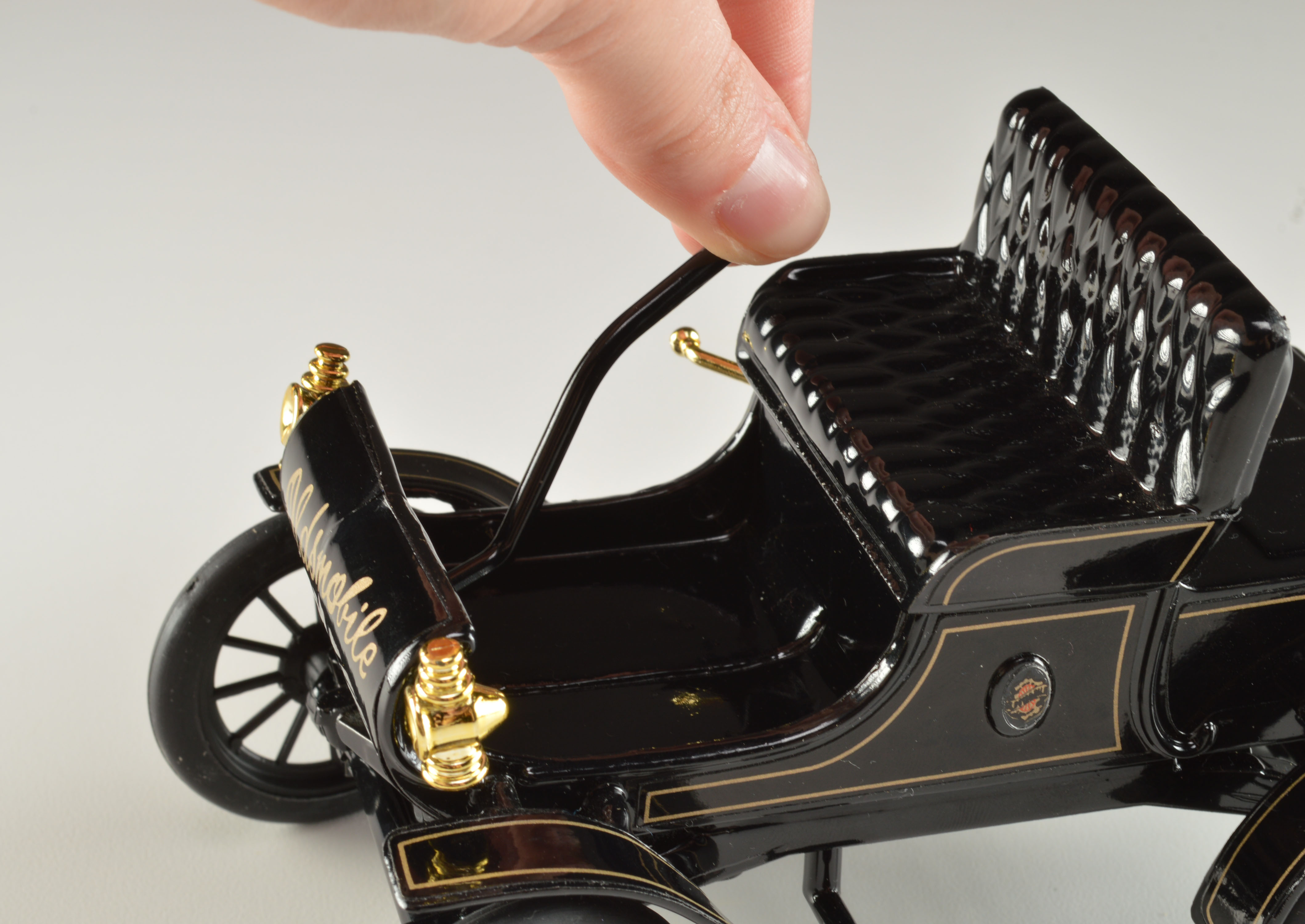 100th Anniversary of Early 1900s Oldsmobile Die-Cast Model Car