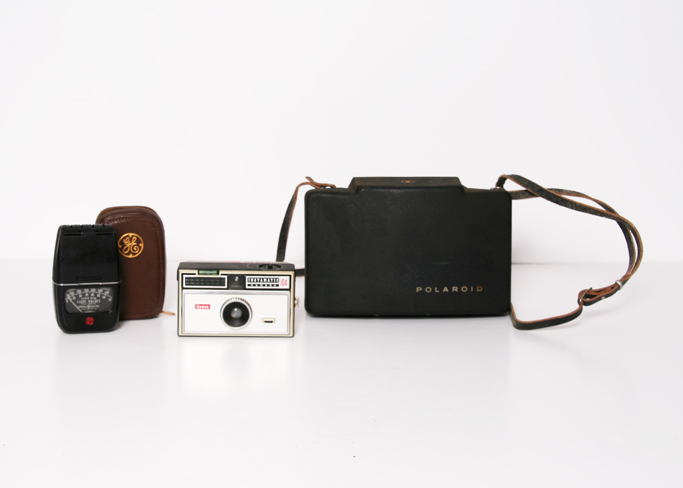 Collection of Vintage Cameras and Accessories