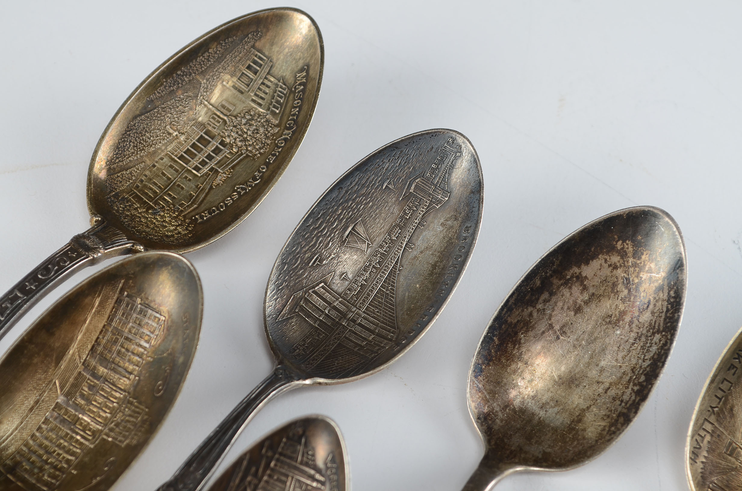 Nine Antique Sterling Silver Souvenir Spoons 