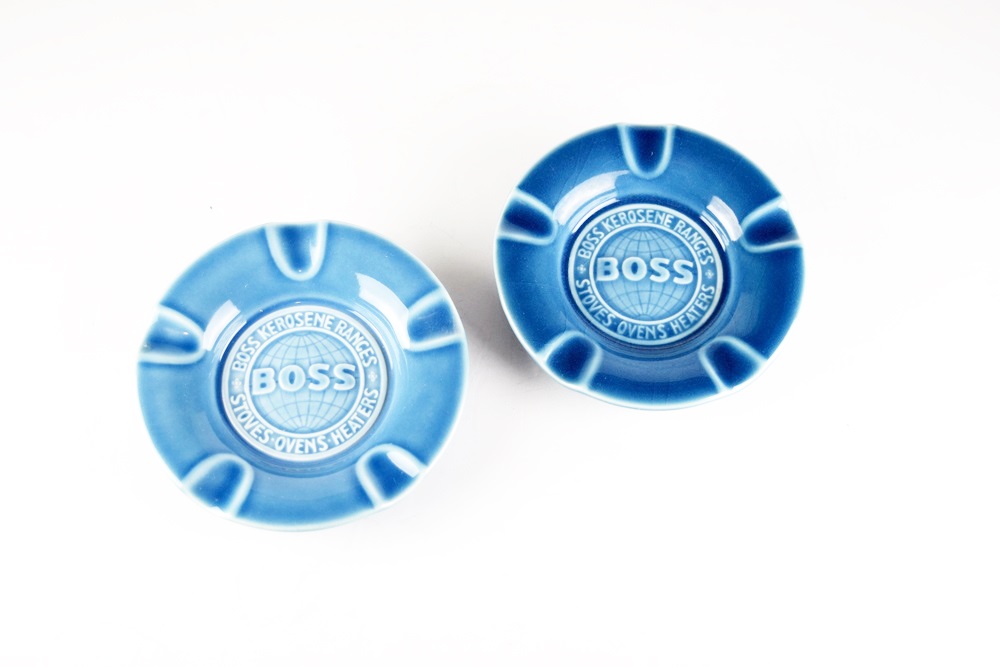 A Pair of Rookwood Ash Receivers Advertising "Boss" Products 1947