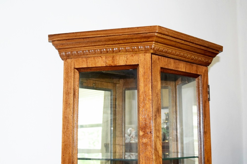 A Curio Cabinet in Oak with Three Glass Shelves