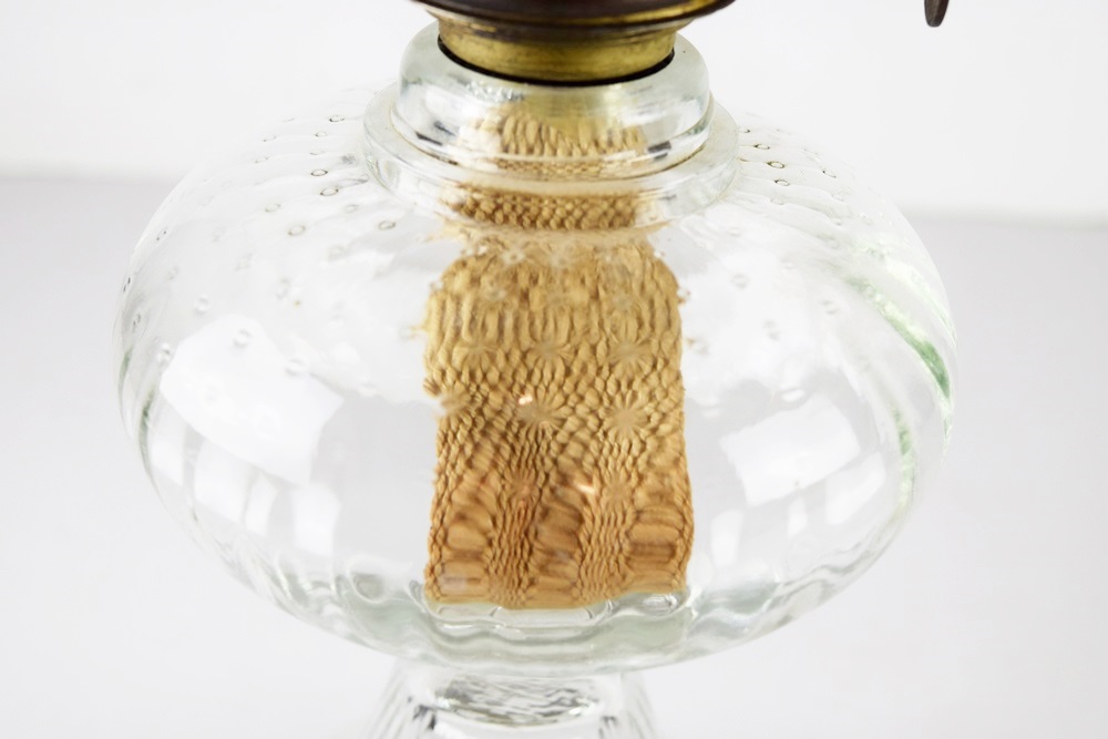 Four Antique Oil Lamps in a Variety of Sizes