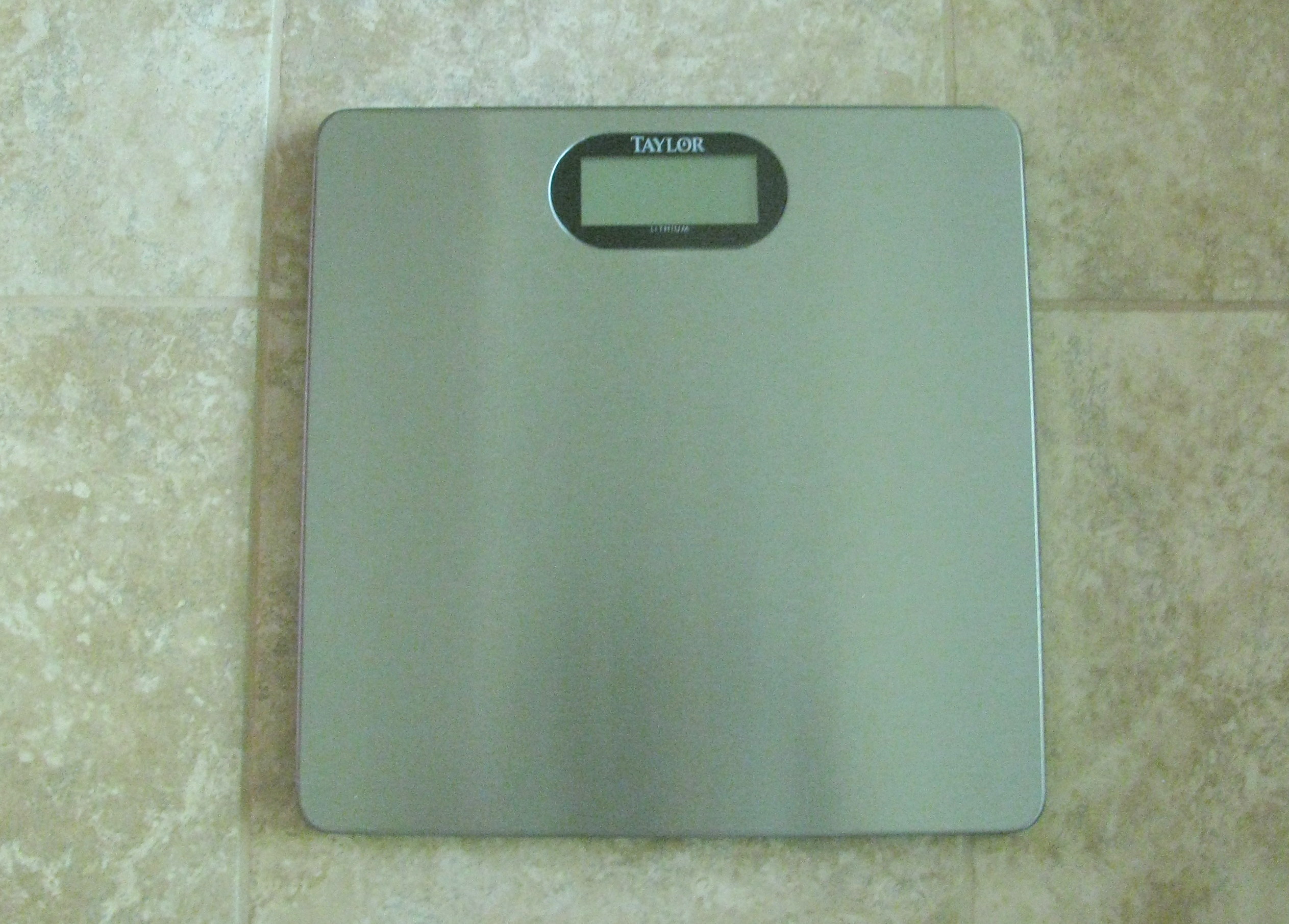 Stainless Steel Digital Scale and Three Bathroom Accent Rugs