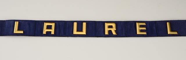 Accessories Including a Laurel Leather Belt and Coach Hand Gloves