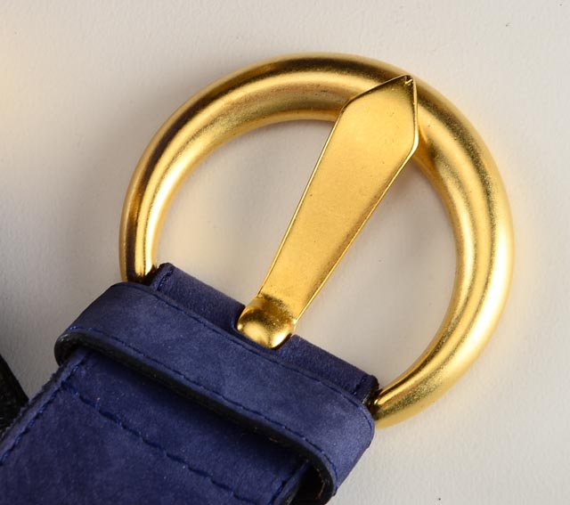 Accessories Including a Laurel Leather Belt and Coach Hand Gloves