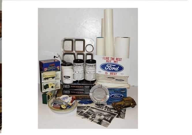 Two Boxes Filled with Ford Novelties
