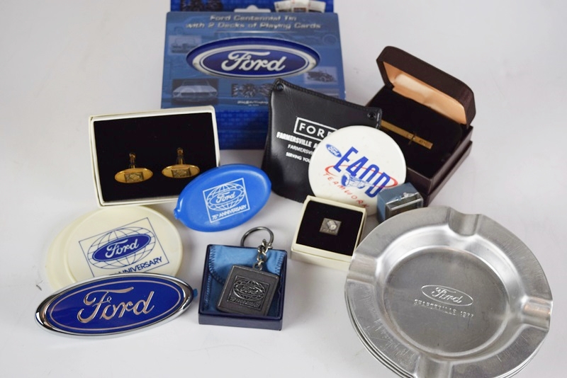 Two Boxes Filled with Ford Novelties
