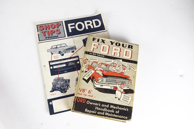 Two Boxes Filled with Ford Novelties
