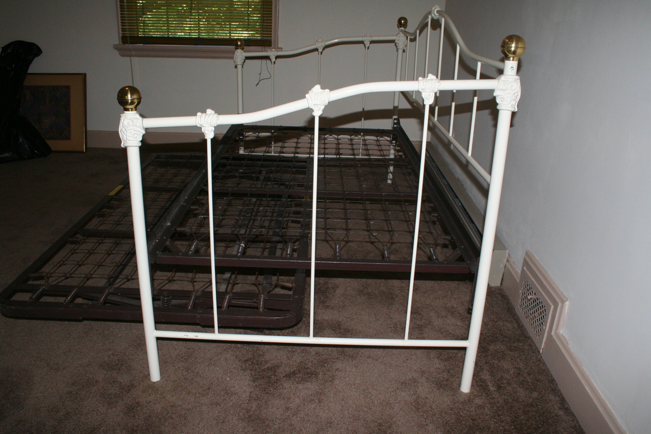 Two Iron Trundle Beds