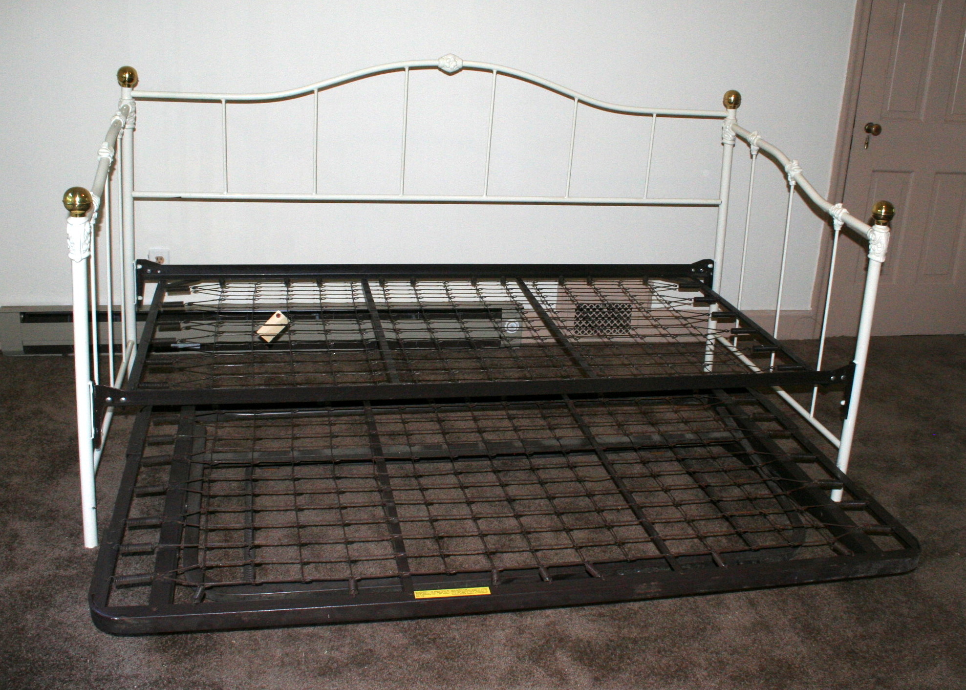 Two Iron Trundle Beds