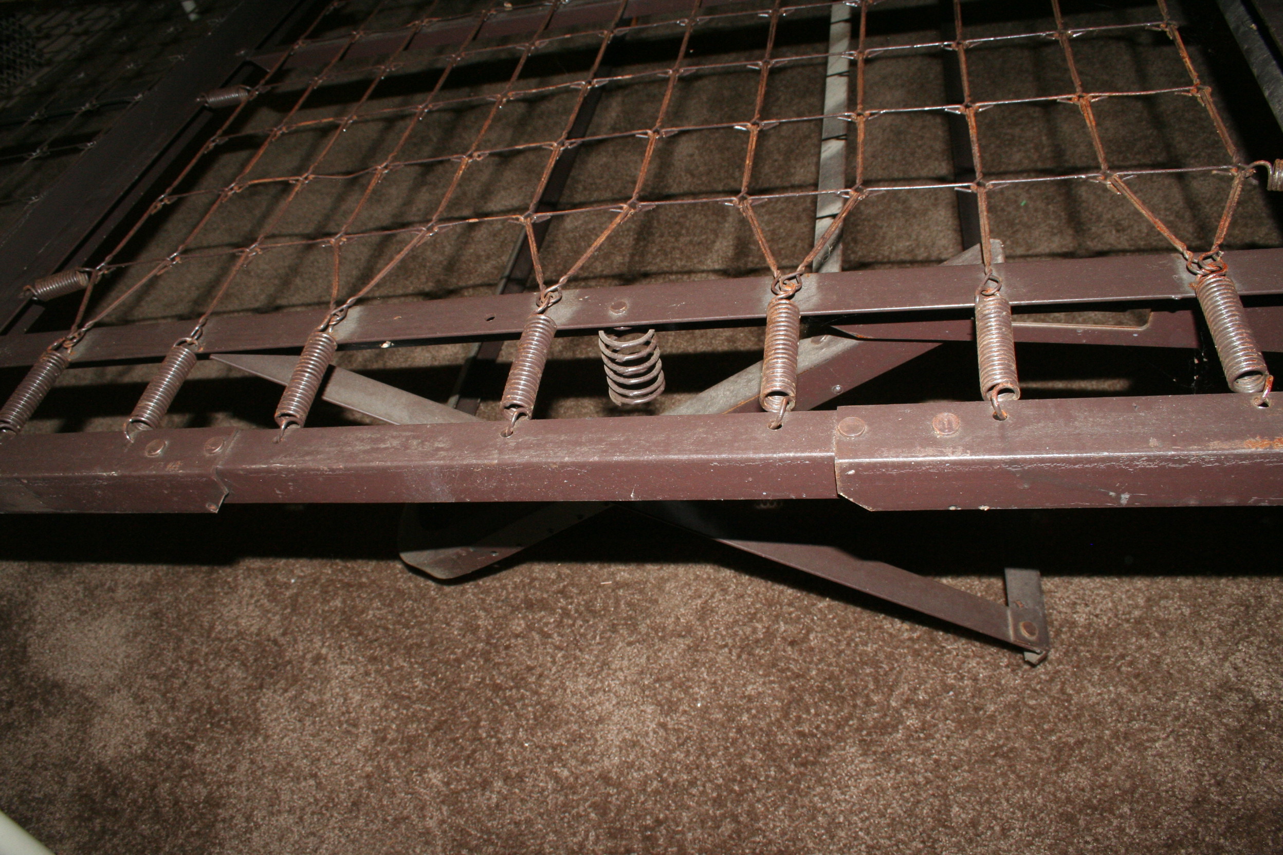 Two Iron Trundle Beds