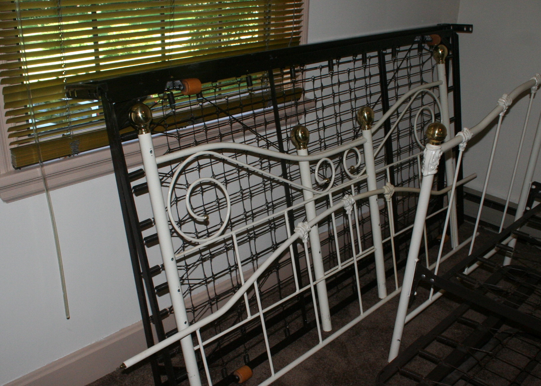 Two Iron Trundle Beds