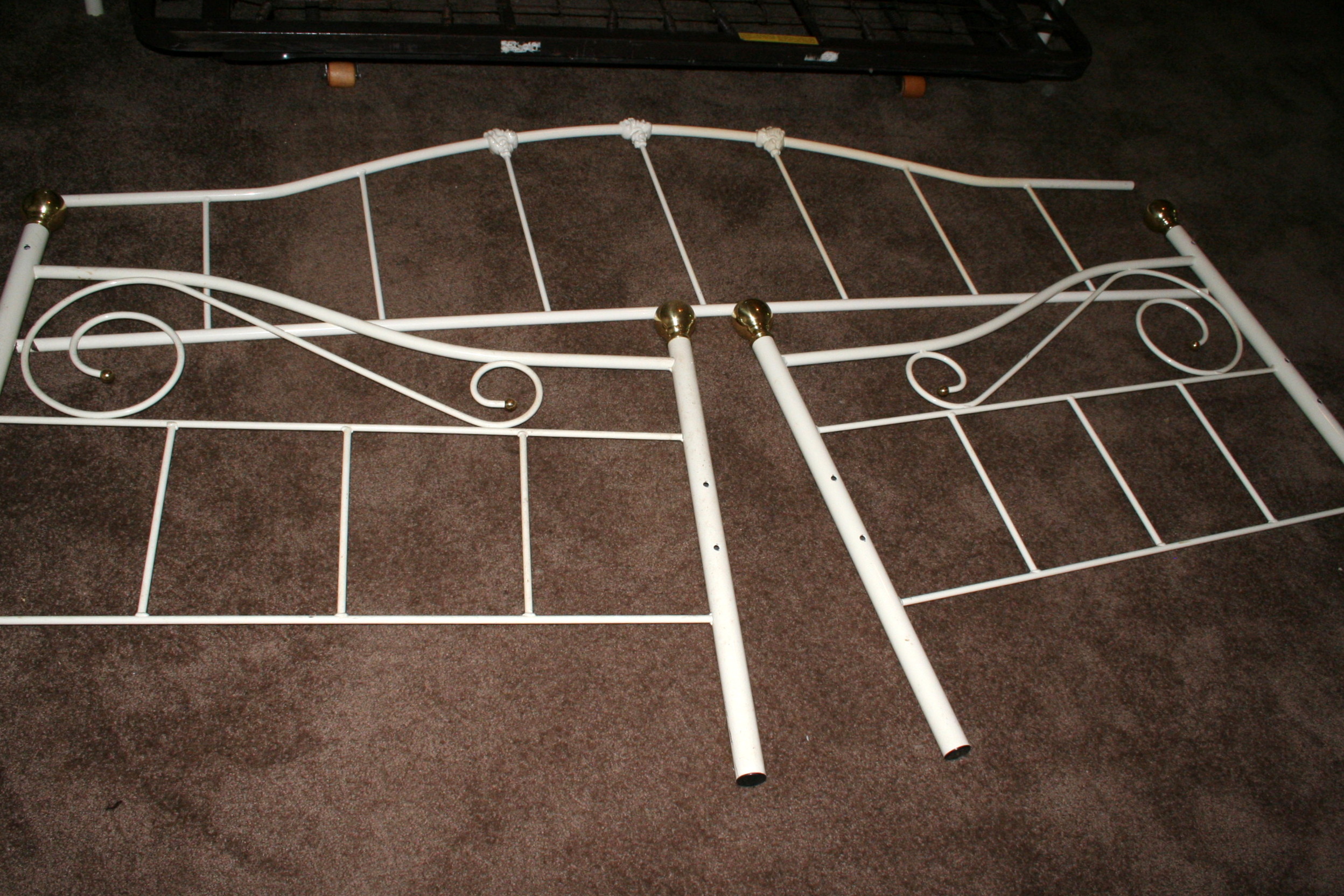 Two Iron Trundle Beds