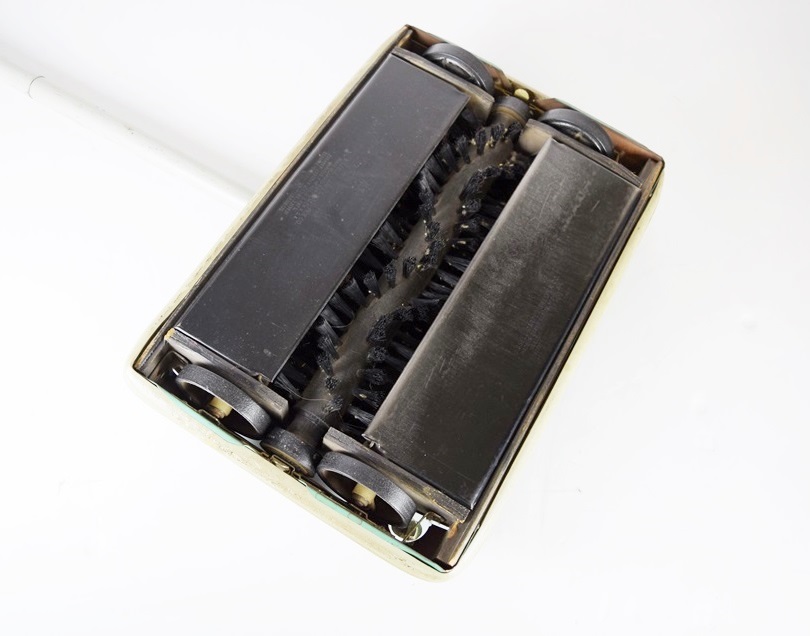 A Vintage Bissell Floor Sweeper