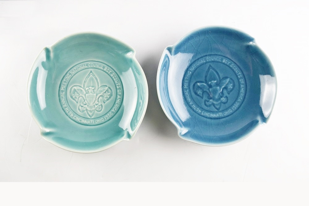 A Collection of Seven Rookwood Advertising Ash Receivers