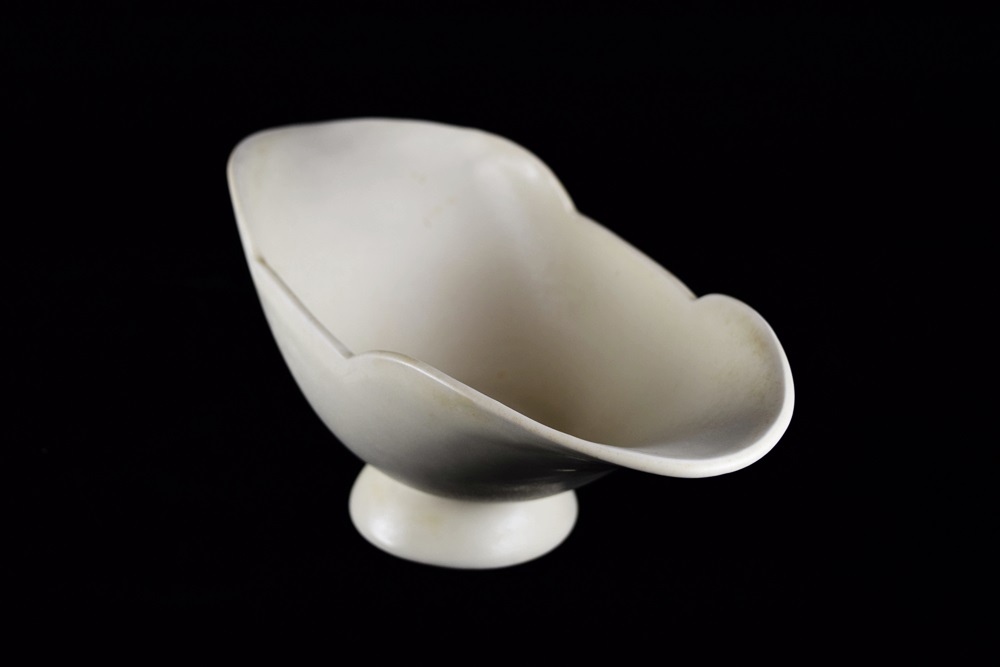 An Elliptical Rookwood Centerpiece in Matte Ivory Glaze, 1943 