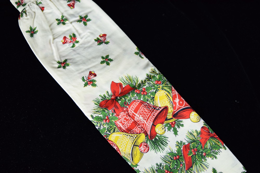 Eleven Vintage Aprons in a Variety of Prints