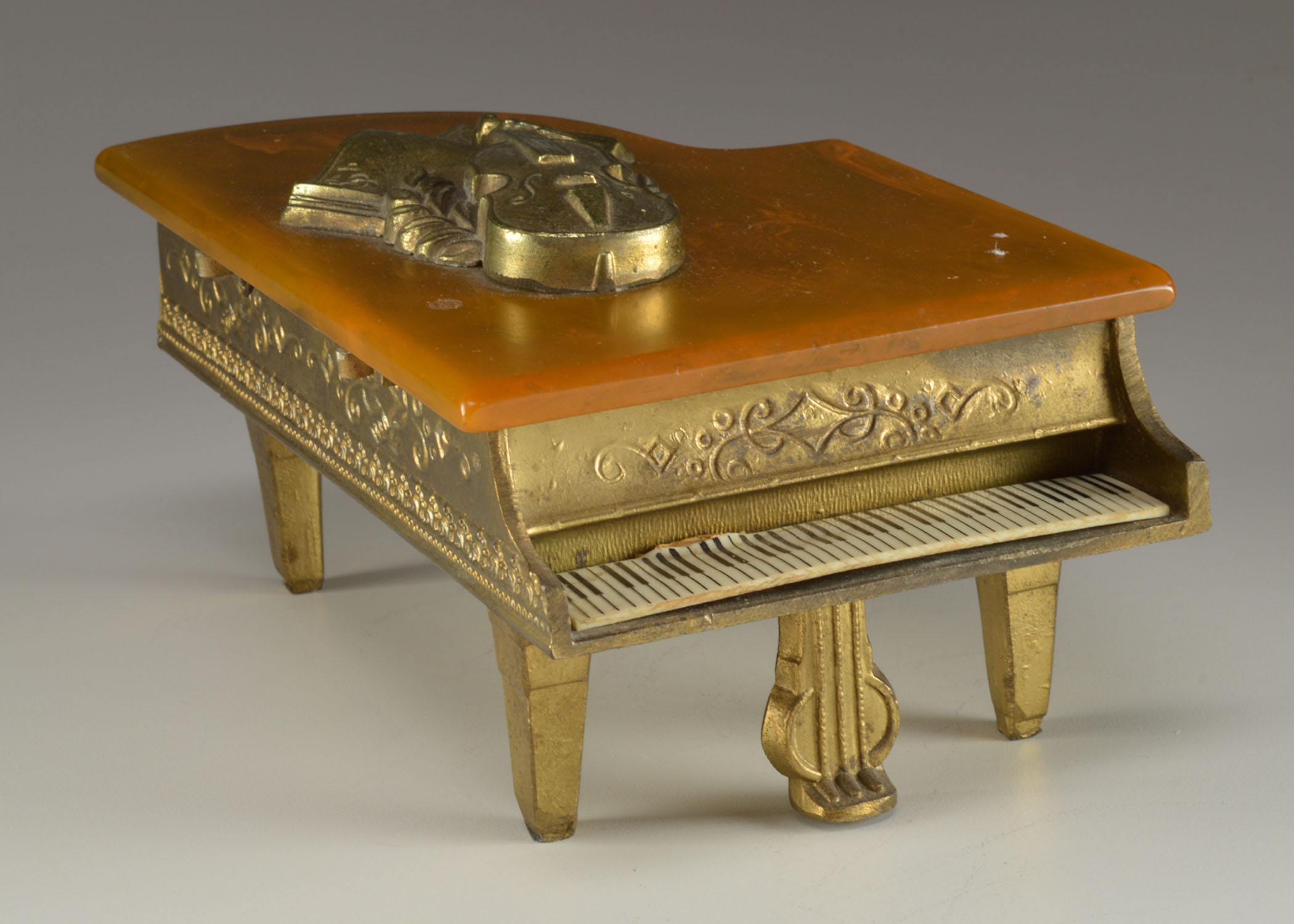 1940s Metal Piano Music Box/Cigarette Case with Bakelite Top