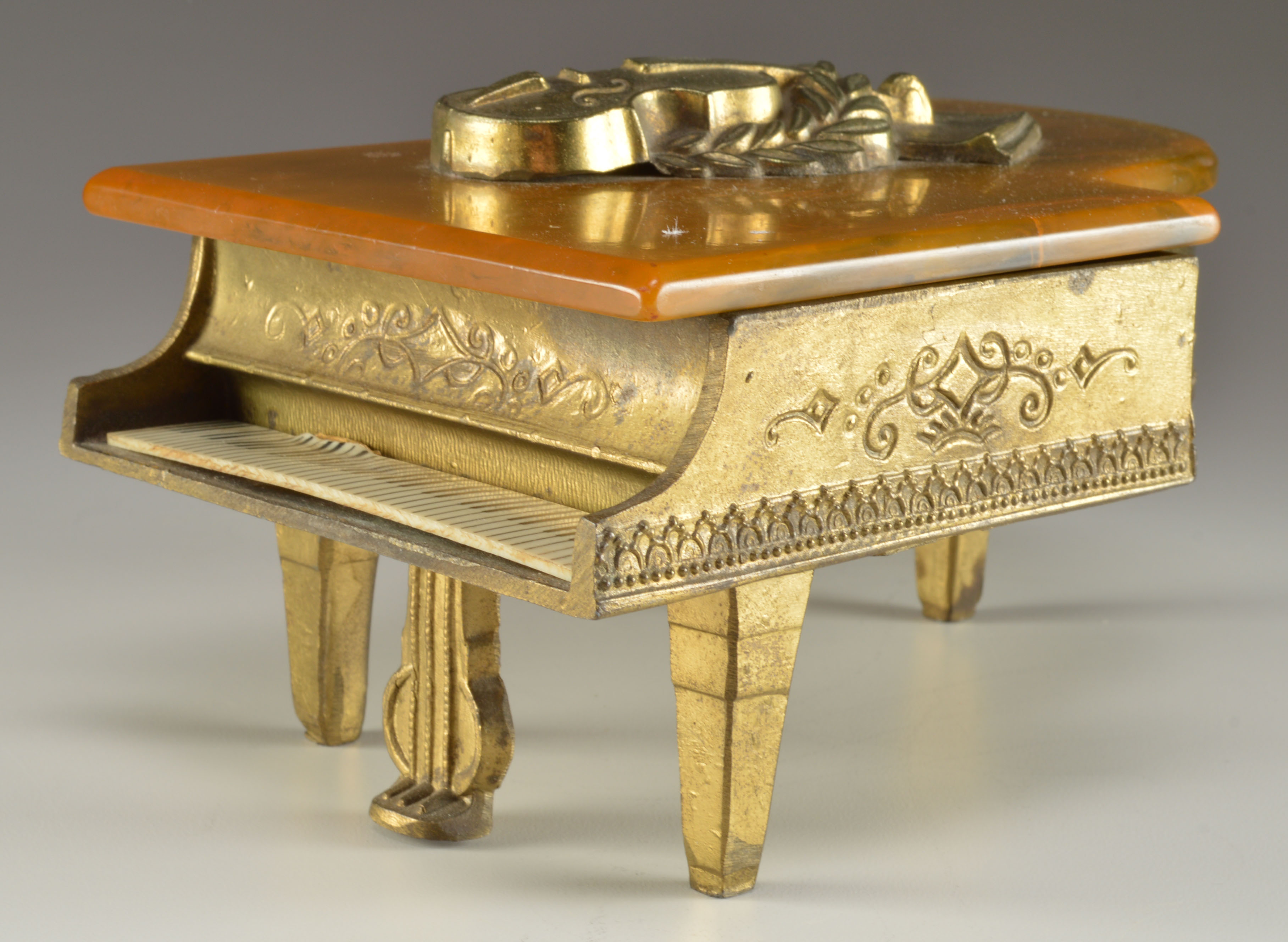 1940s Metal Piano Music Box/Cigarette Case with Bakelite Top