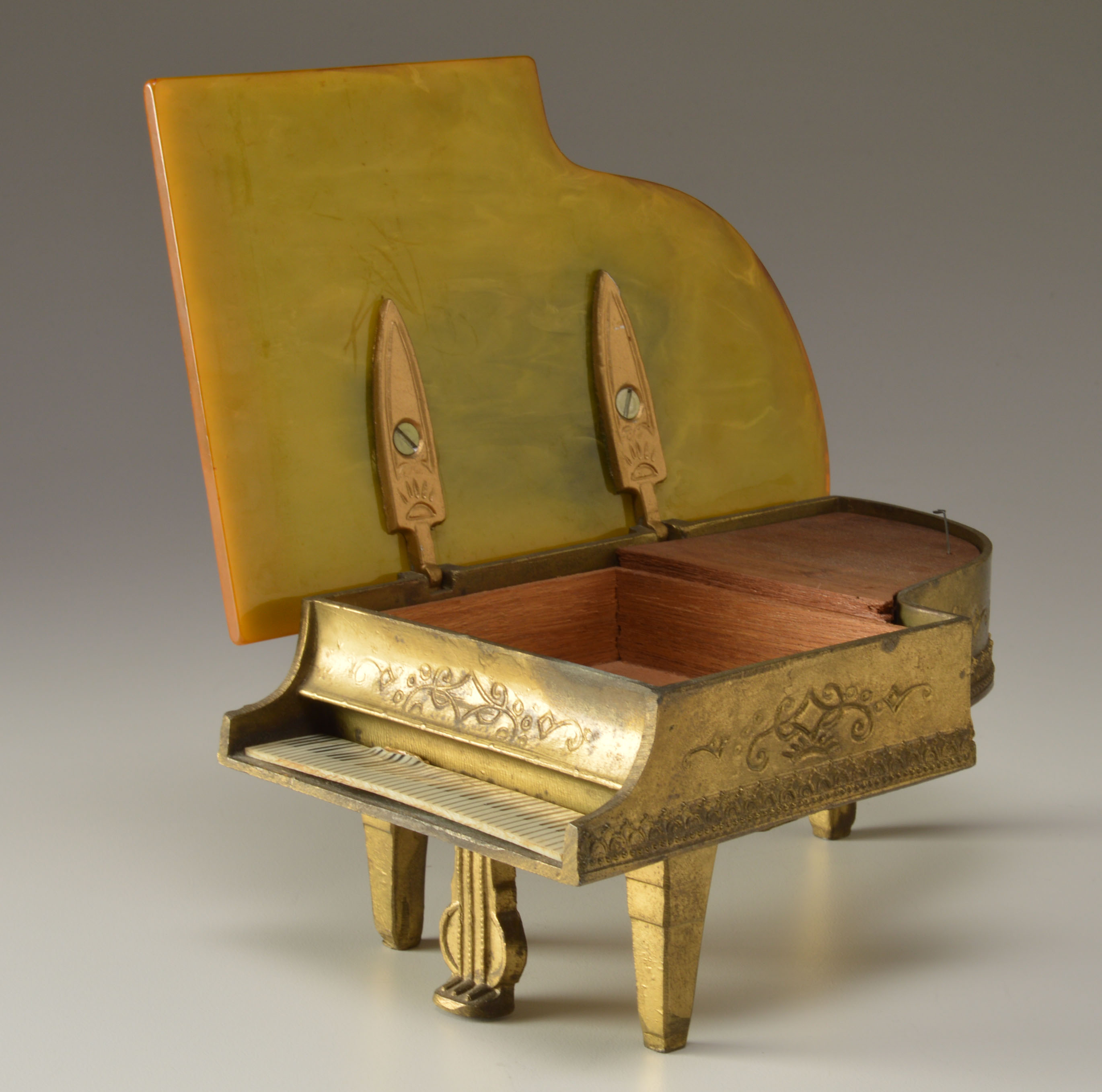1940s Metal Piano Music Box/Cigarette Case with Bakelite Top