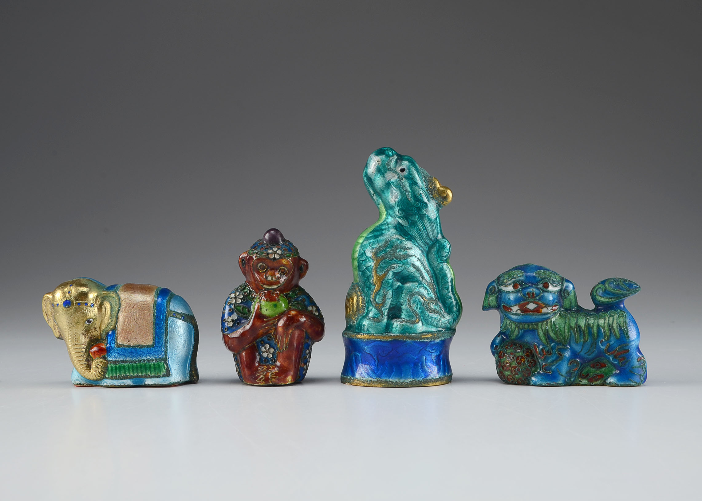 Four Vintage Enameled Porcelain Chinese Figurines
