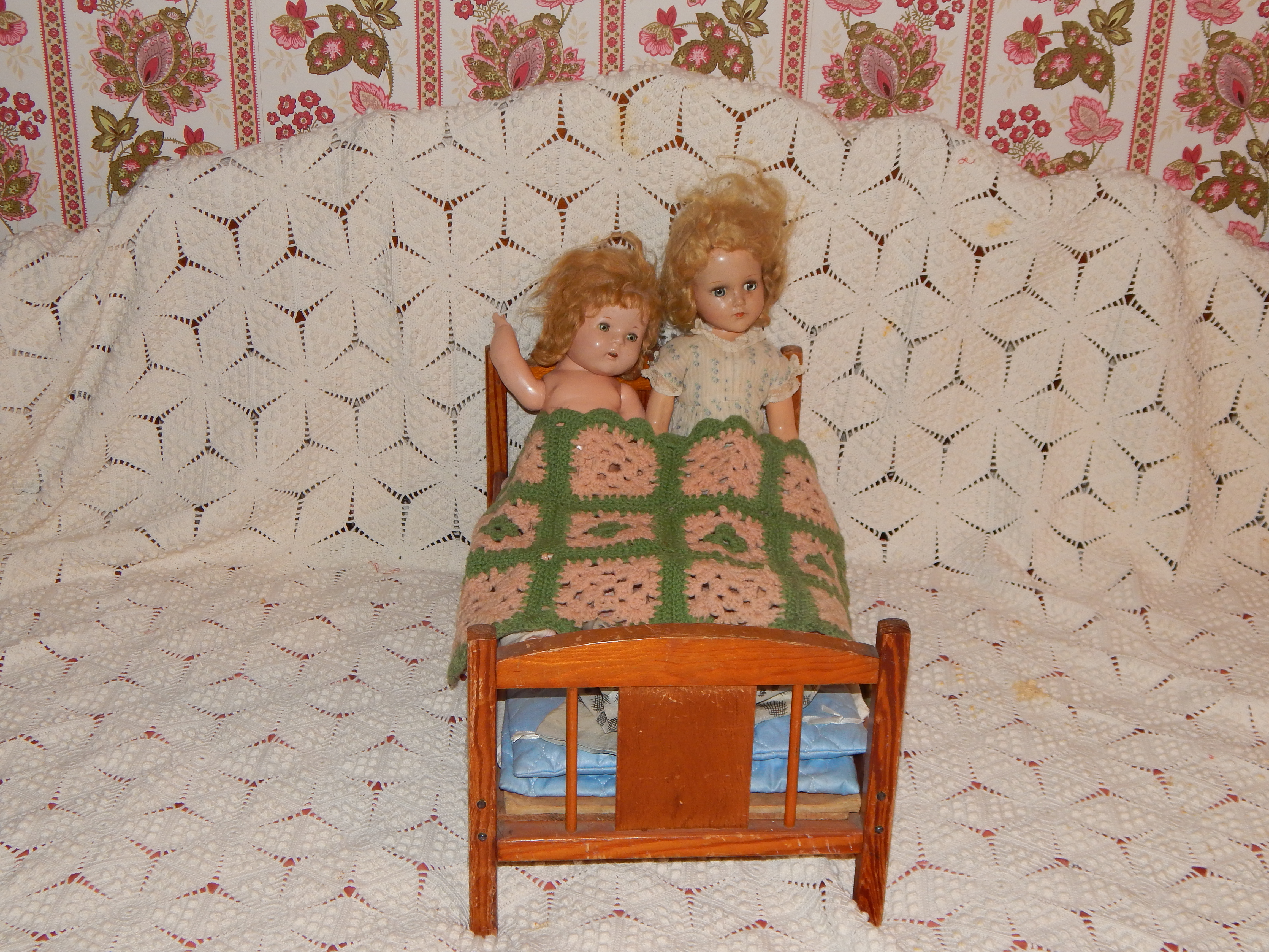 Two Vintage Dolls with Wooden Bed