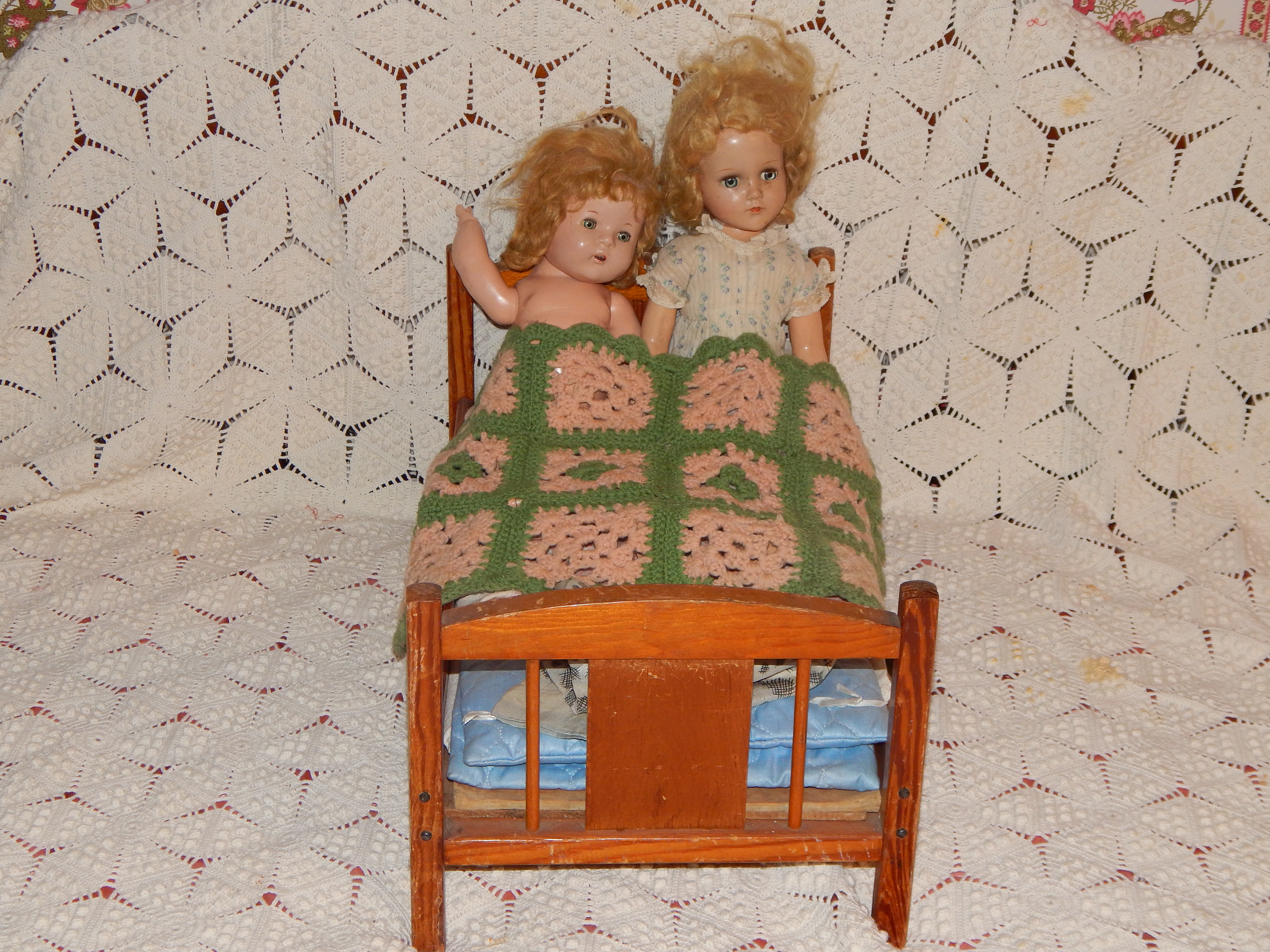 Two Vintage Dolls with Wooden Bed