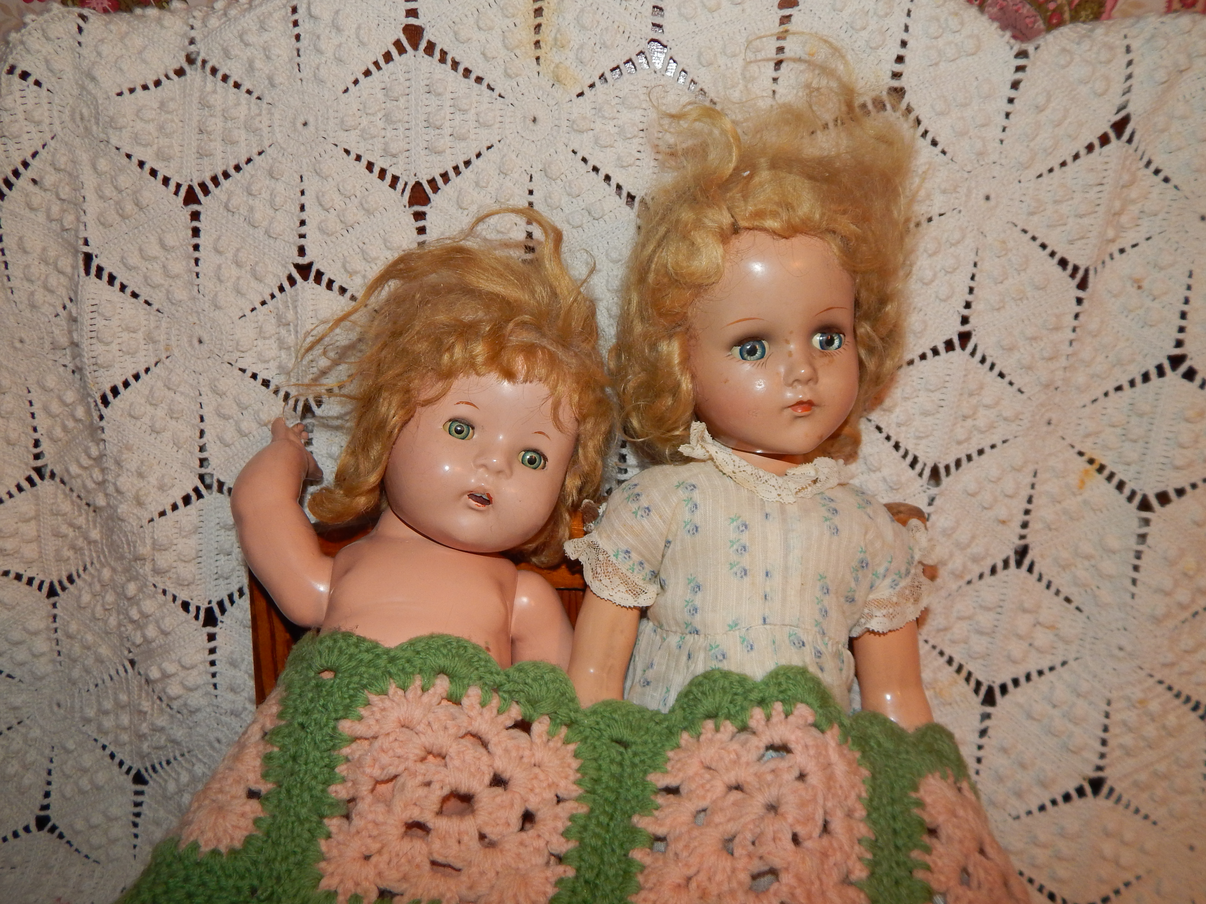 Two Vintage Dolls with Wooden Bed