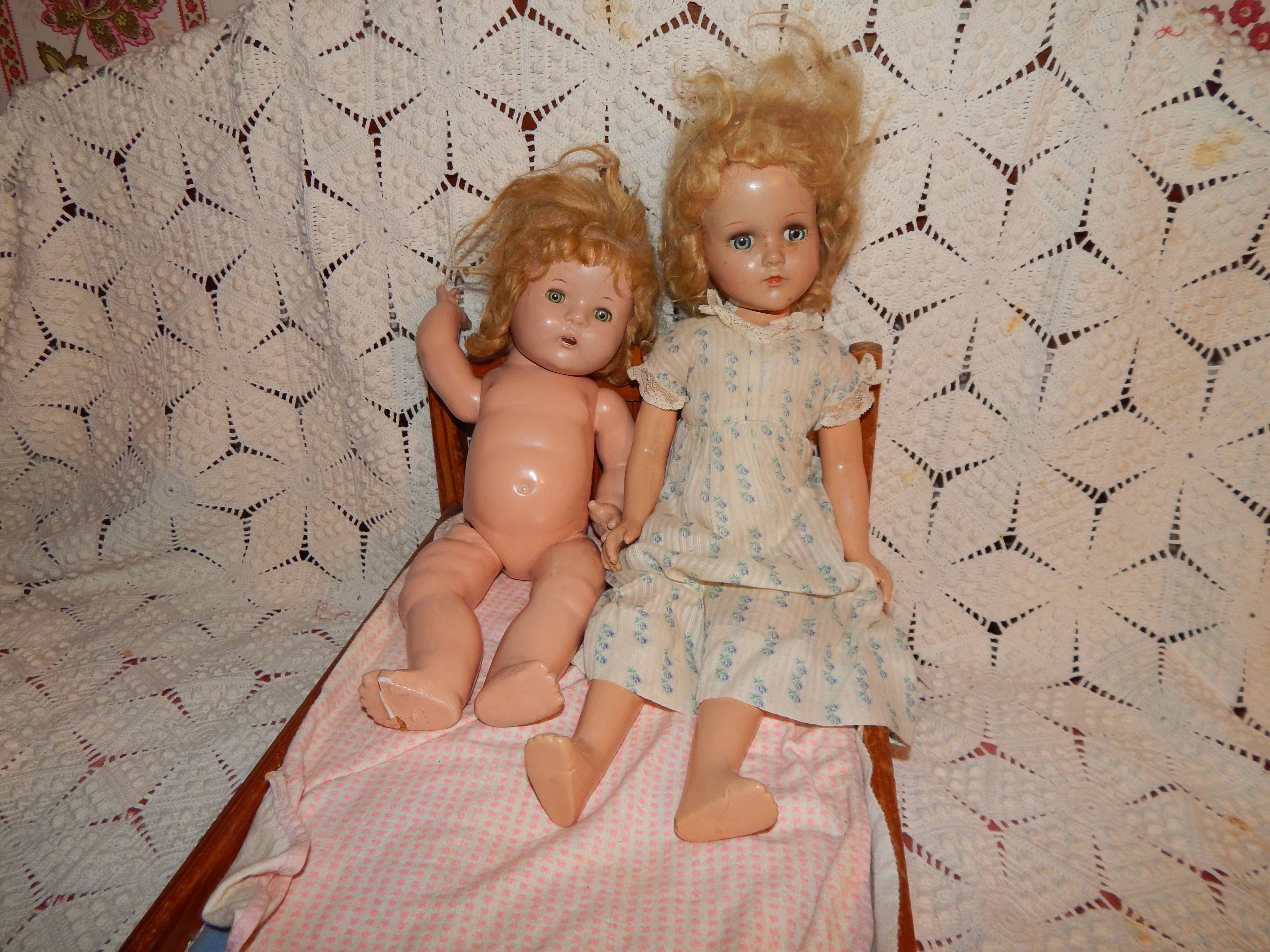 Two Vintage Dolls with Wooden Bed