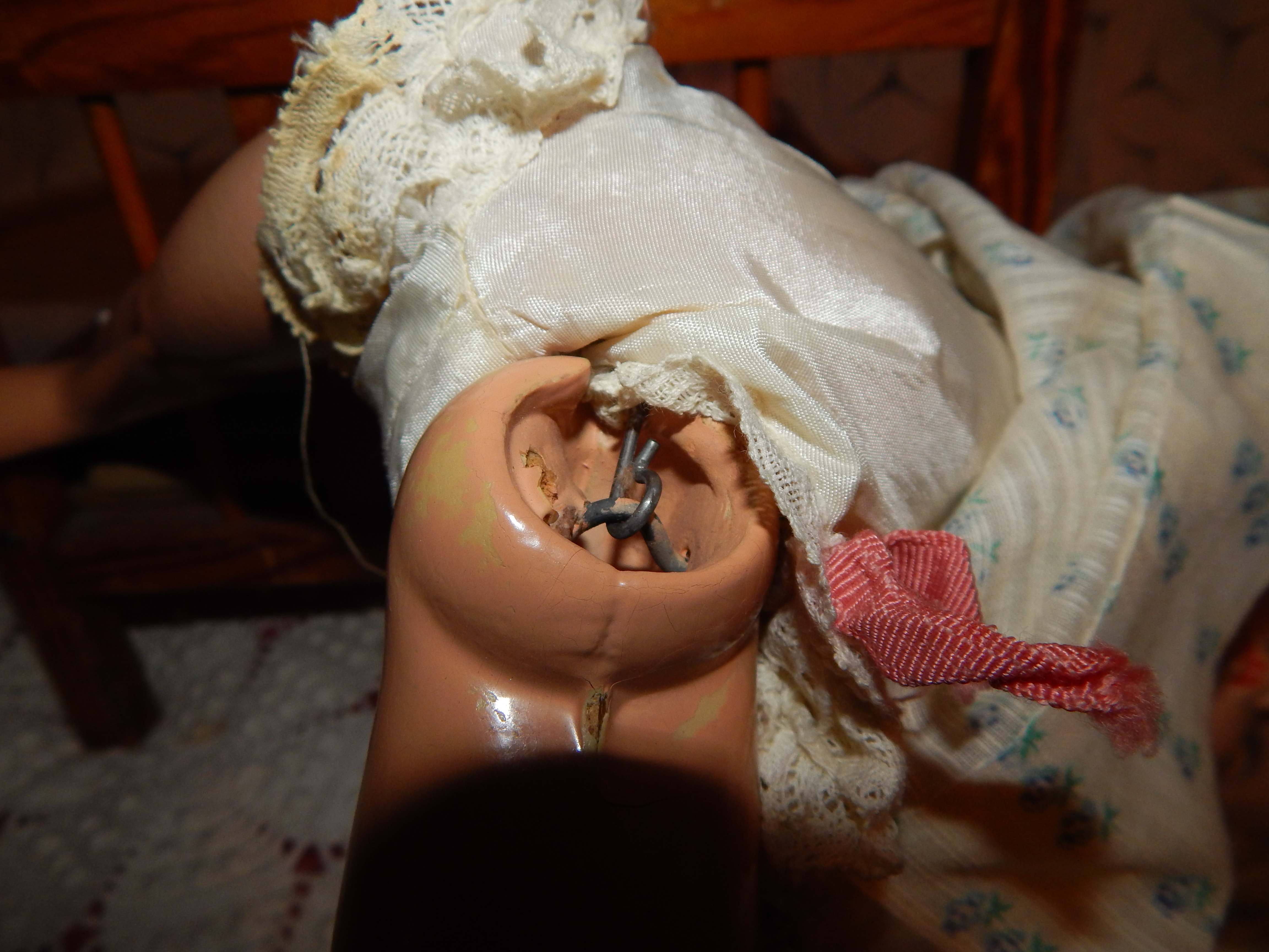 Two Vintage Dolls with Wooden Bed