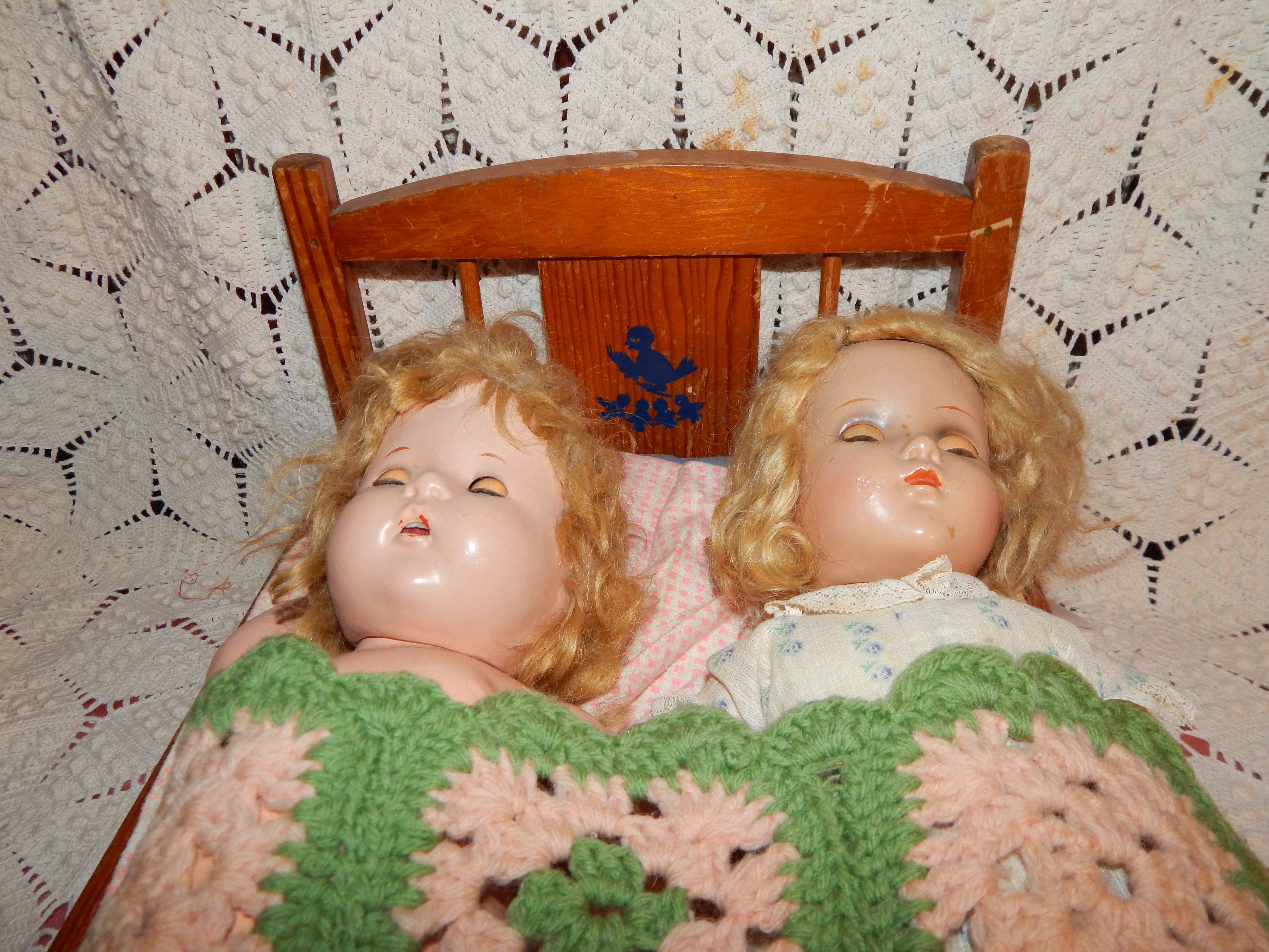 Two Vintage Dolls with Wooden Bed