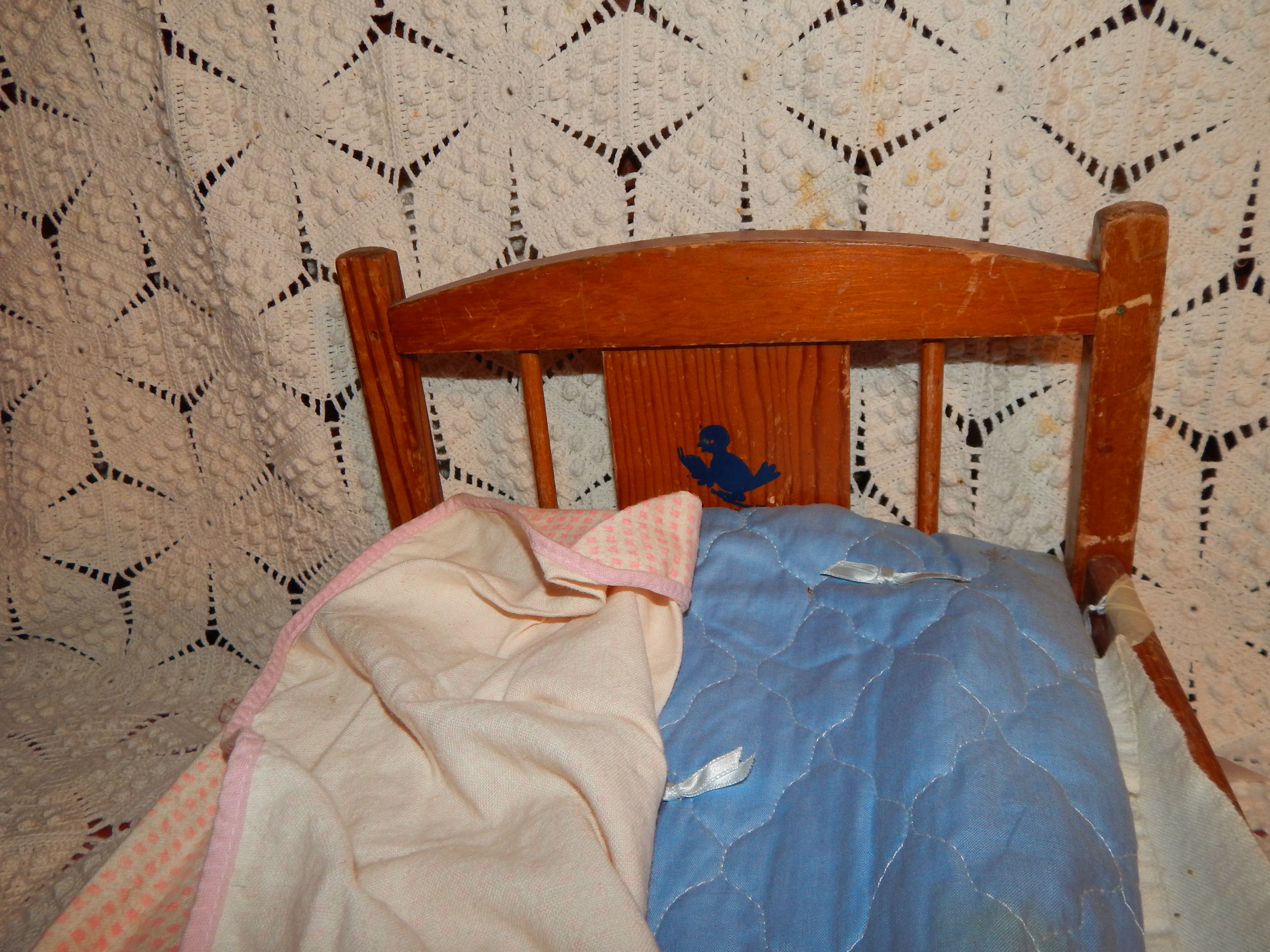 Two Vintage Dolls with Wooden Bed
