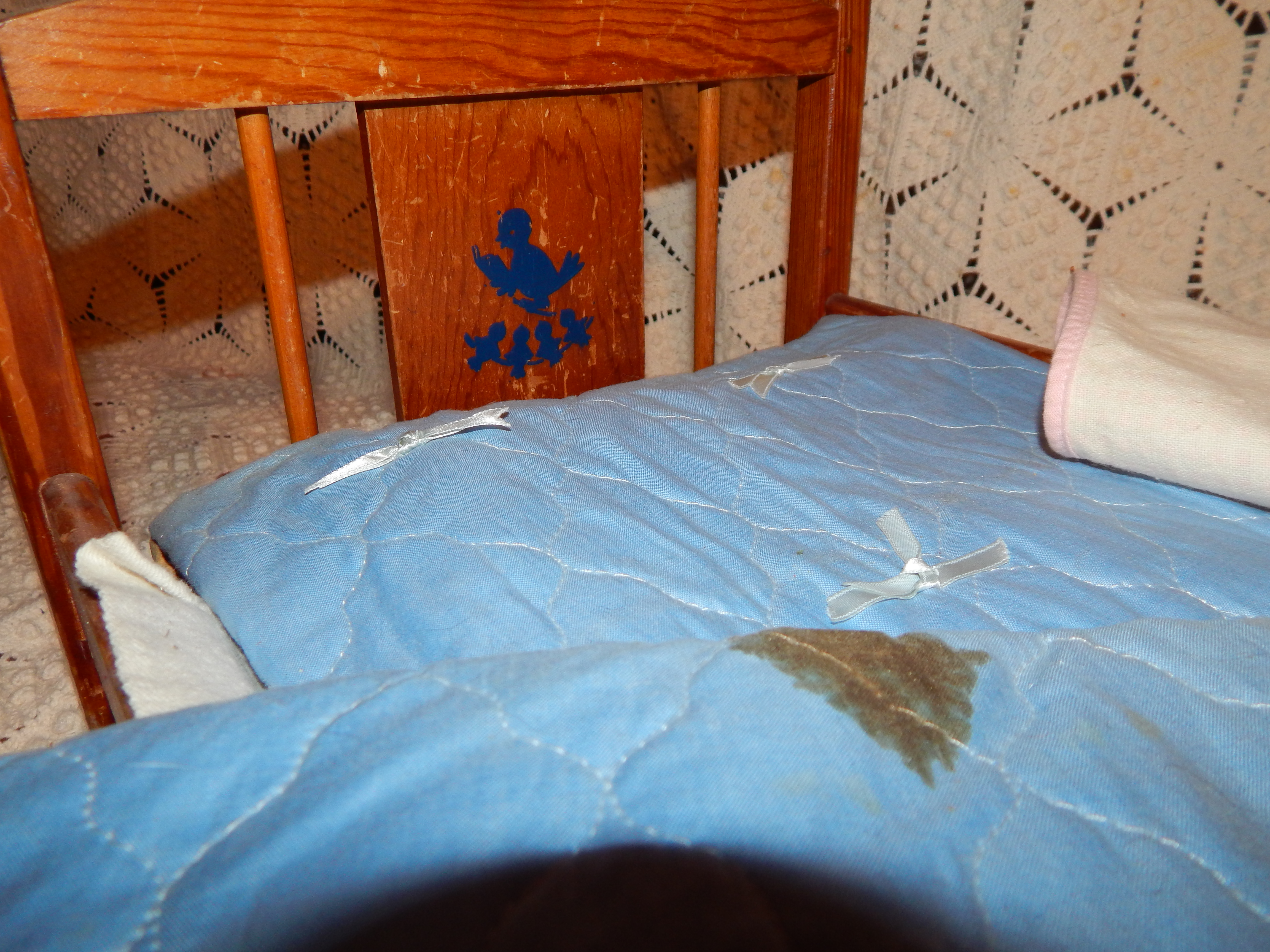 Two Vintage Dolls with Wooden Bed