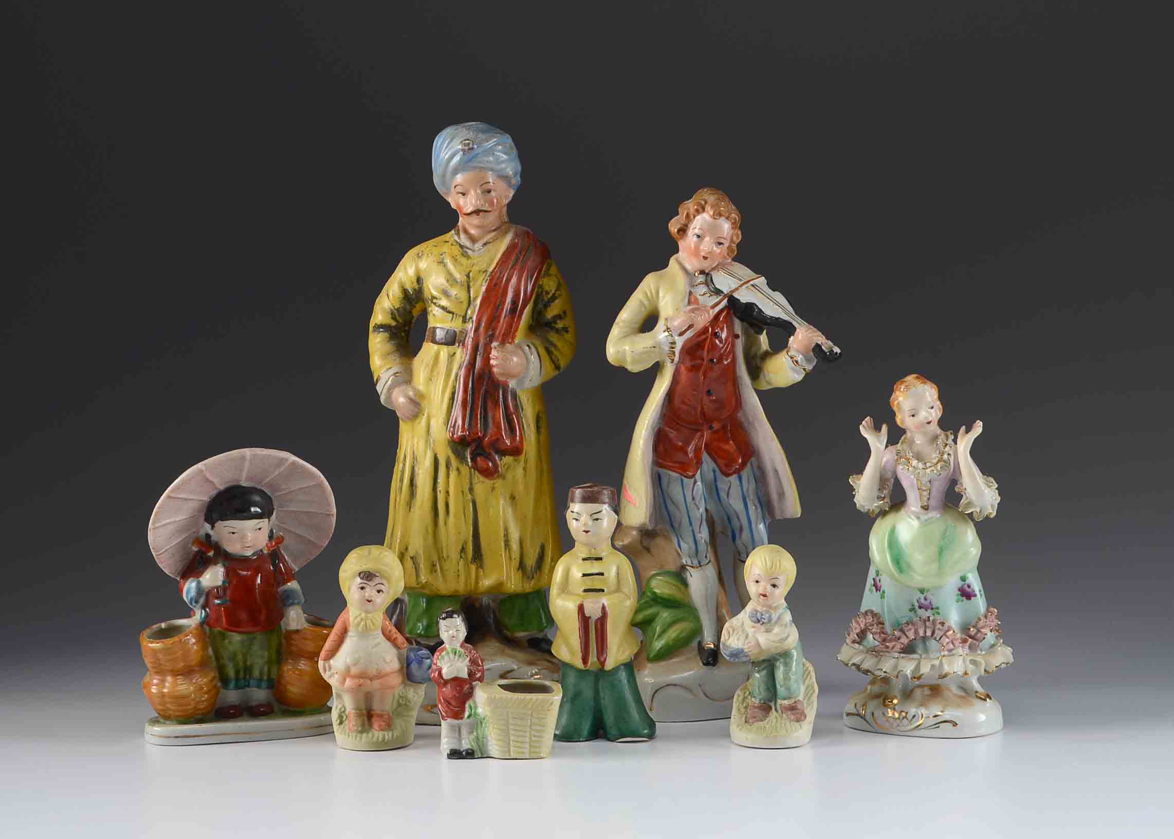Eight Figurines Made in Occupied Japan