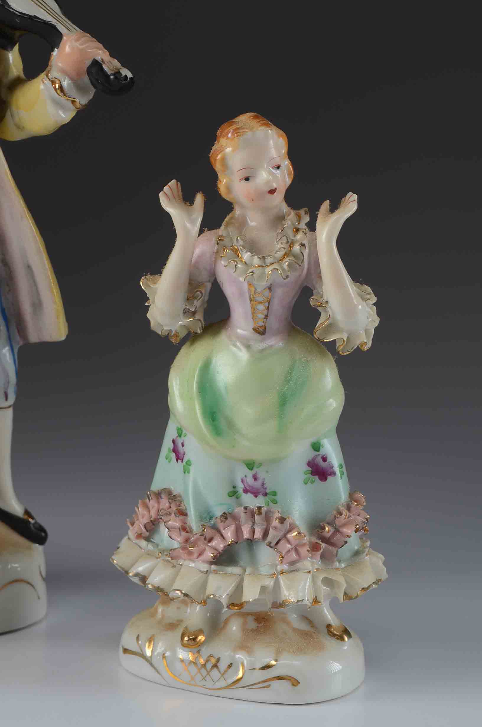 Eight Figurines Made in Occupied Japan