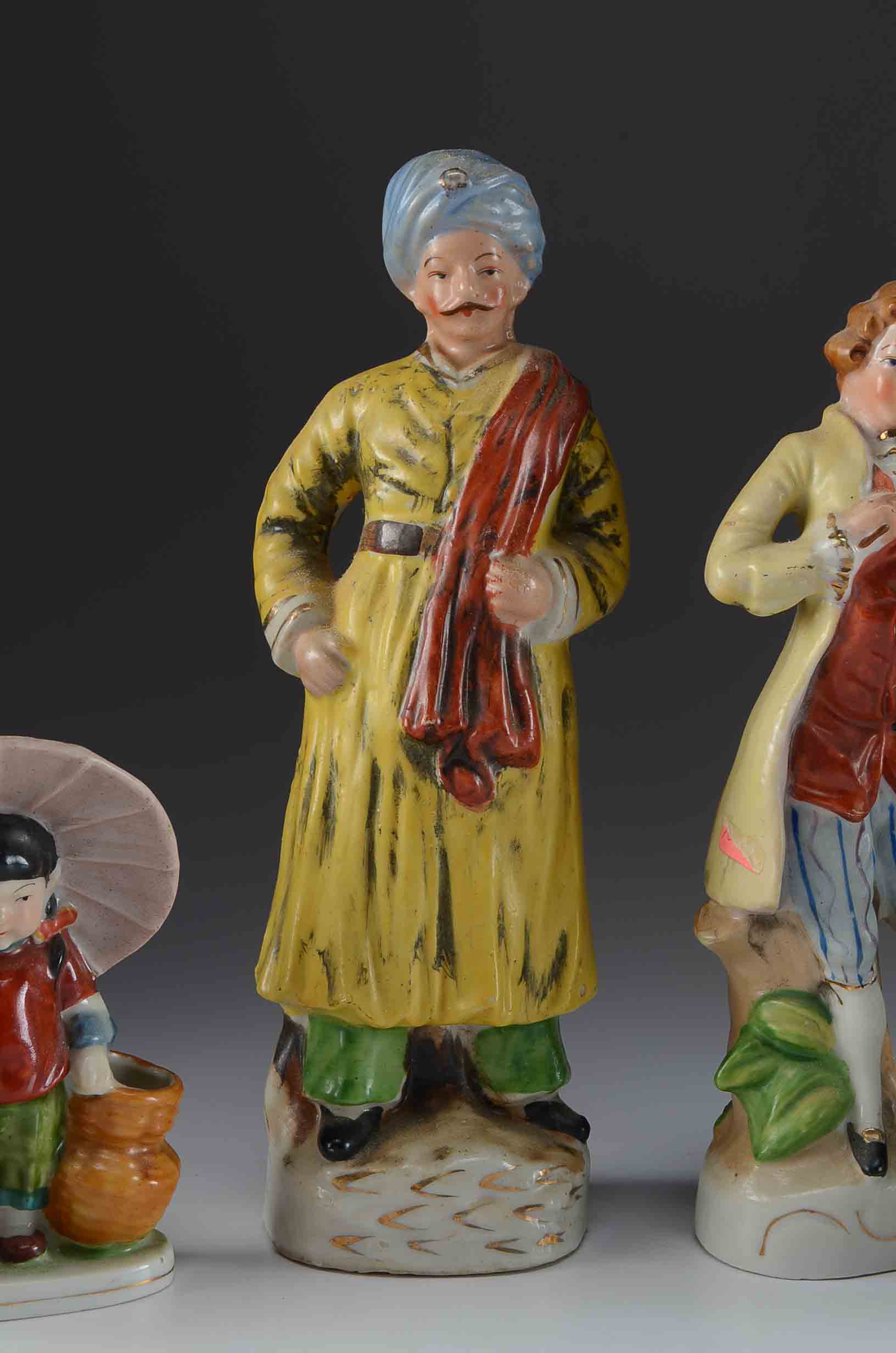 Eight Figurines Made in Occupied Japan