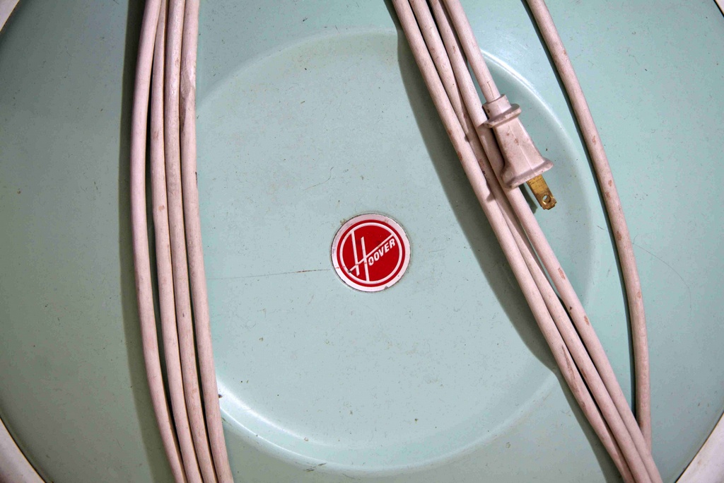 Three Vintage Vacuum Cleaners