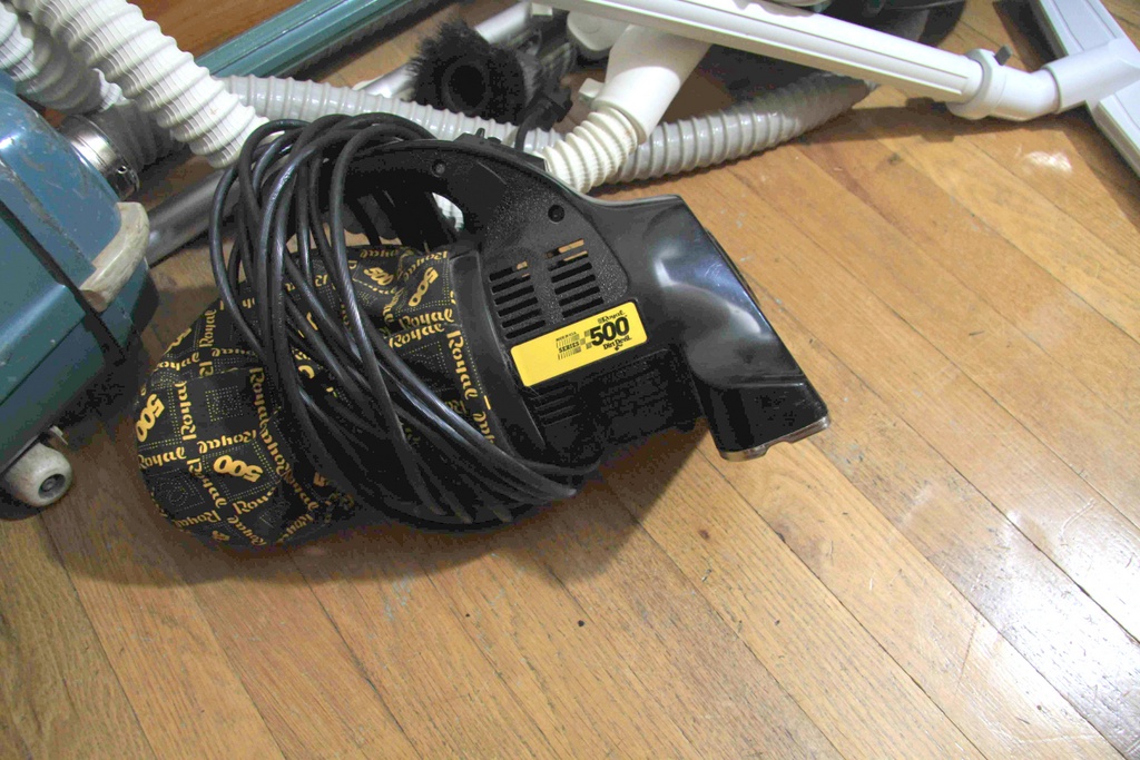 Three Vintage Vacuum Cleaners