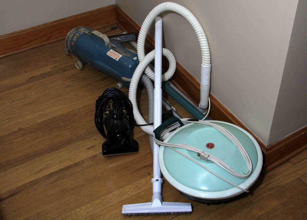 Three Vintage Vacuum Cleaners