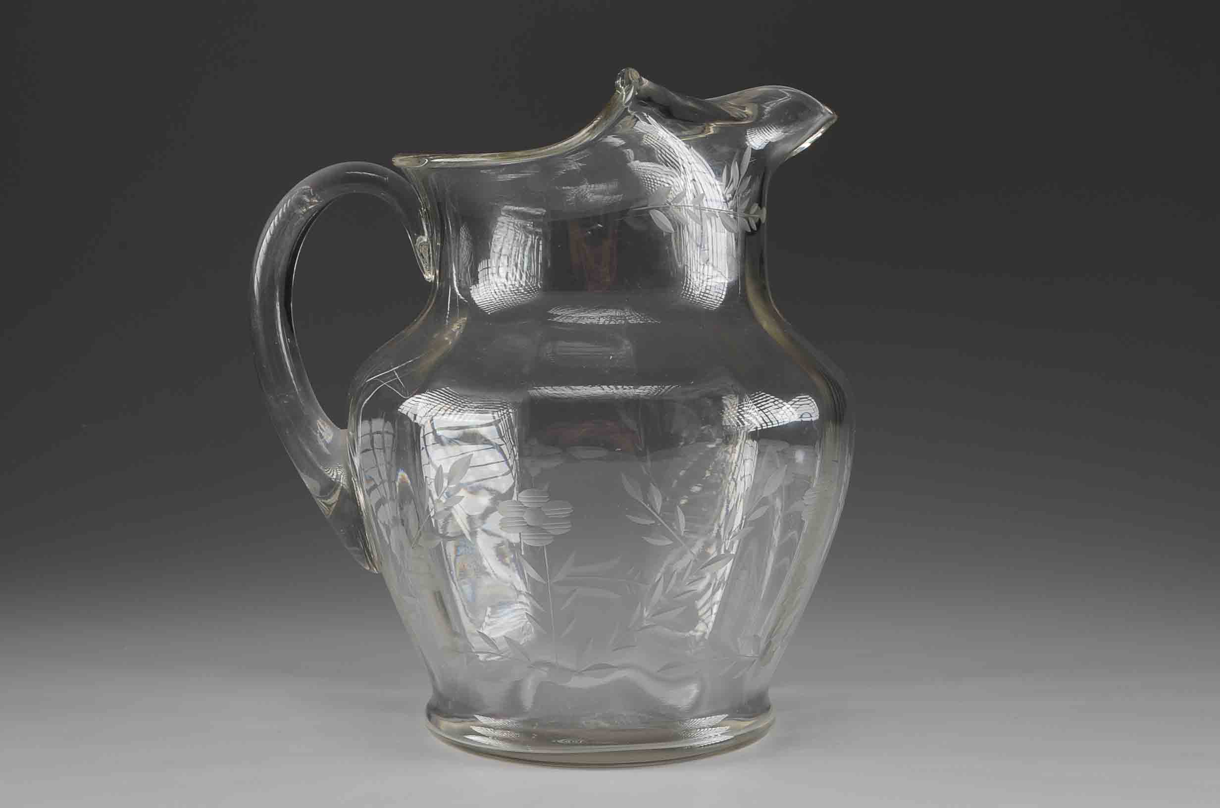  A Vintage Cut Glass Pitcher and Glass Set