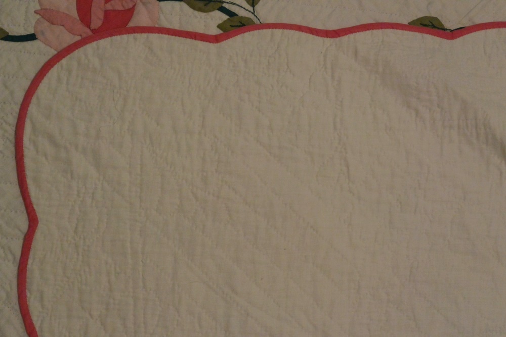 Beautiful Handmade Quilt with Roses and Scalloped Edge